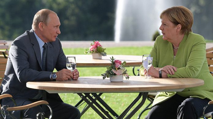 Ппутин_и_Меркель
